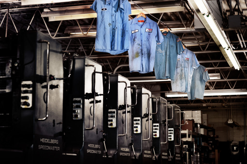 Front Room captured dirty work shirts hanging in manufacturing facility in Wisconsin