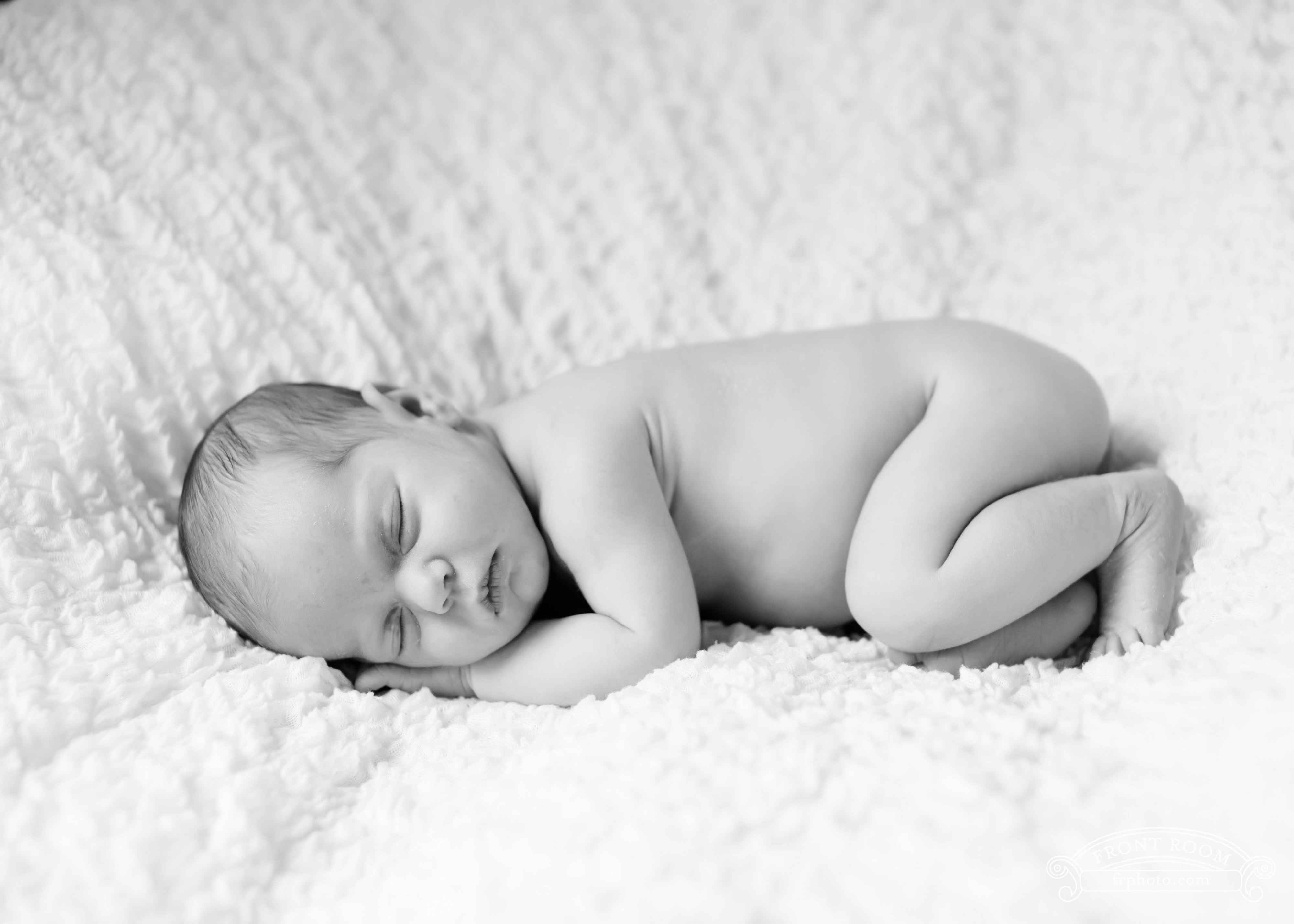 newborn baby girl in black and white